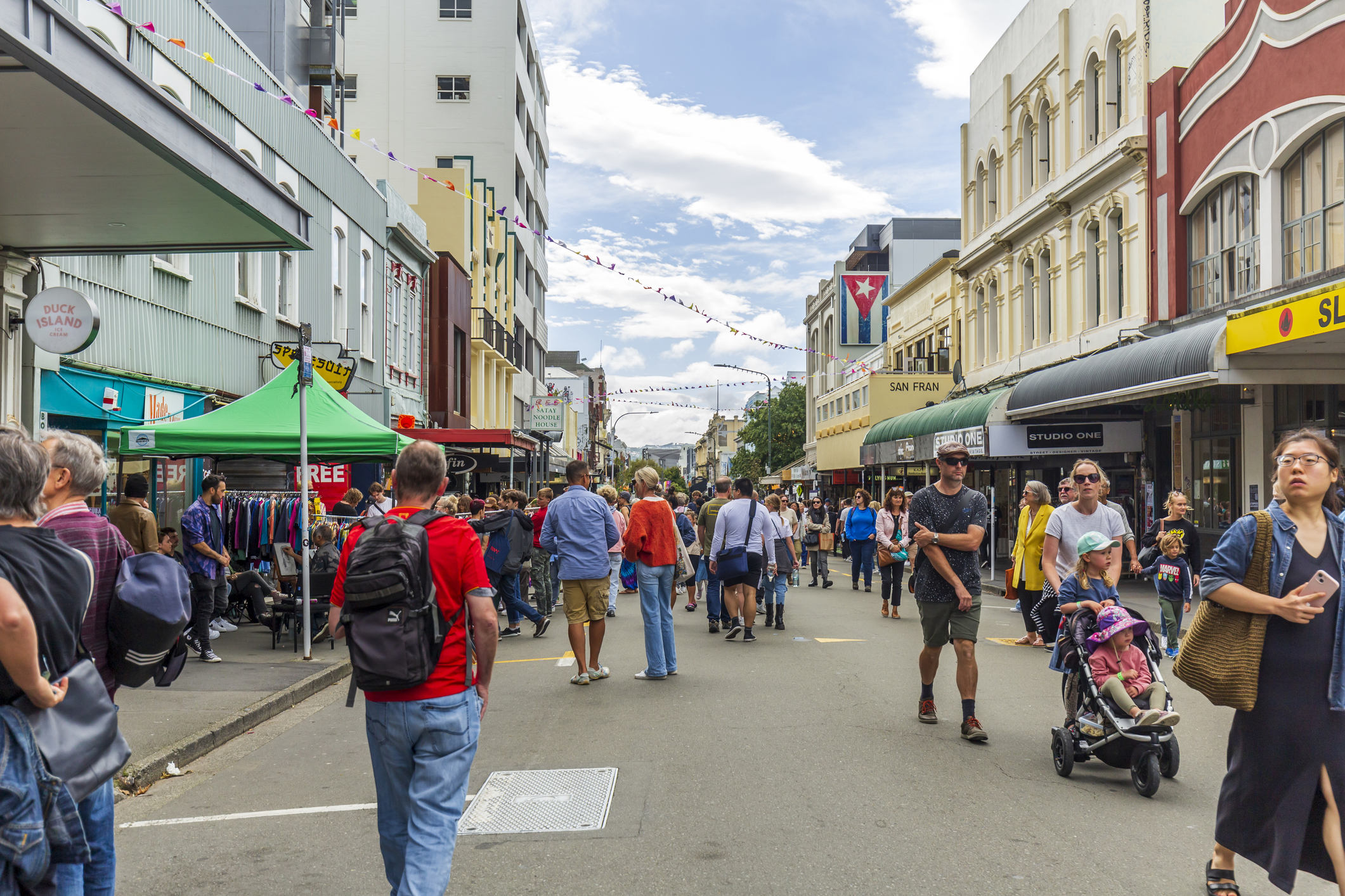Shoppers crowd the streets in Wellington, NZ.